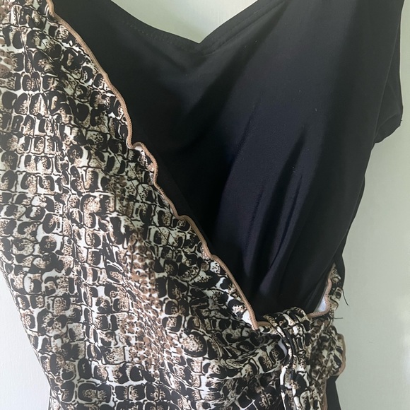 Black and leopard one piece swimsuit. Cross tie sash.  Worn once. Fits like a 6 - Picture 4 of 7